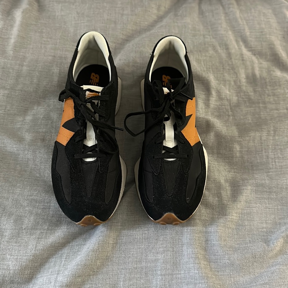 Black and orange new balances practically new.